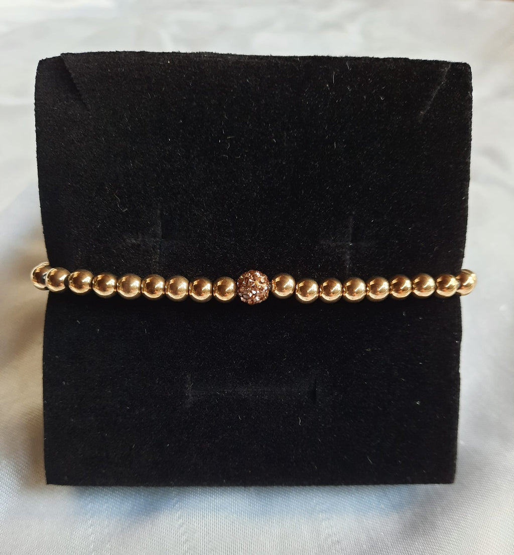 Stretch armband met centraal detail