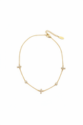 Minimalistische ketting met kruisjes witte achtergrond