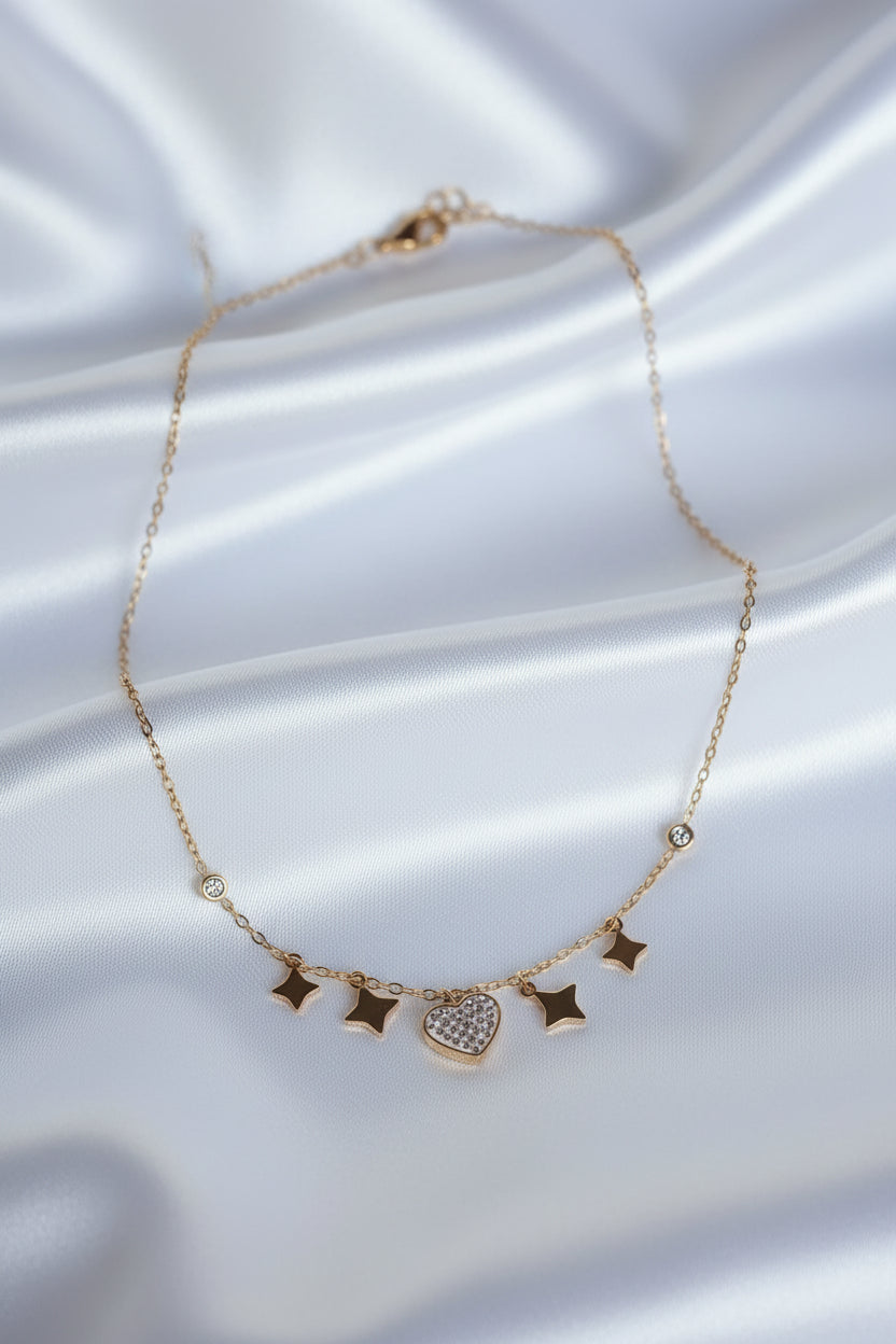 Korte ketting met hart en sterren