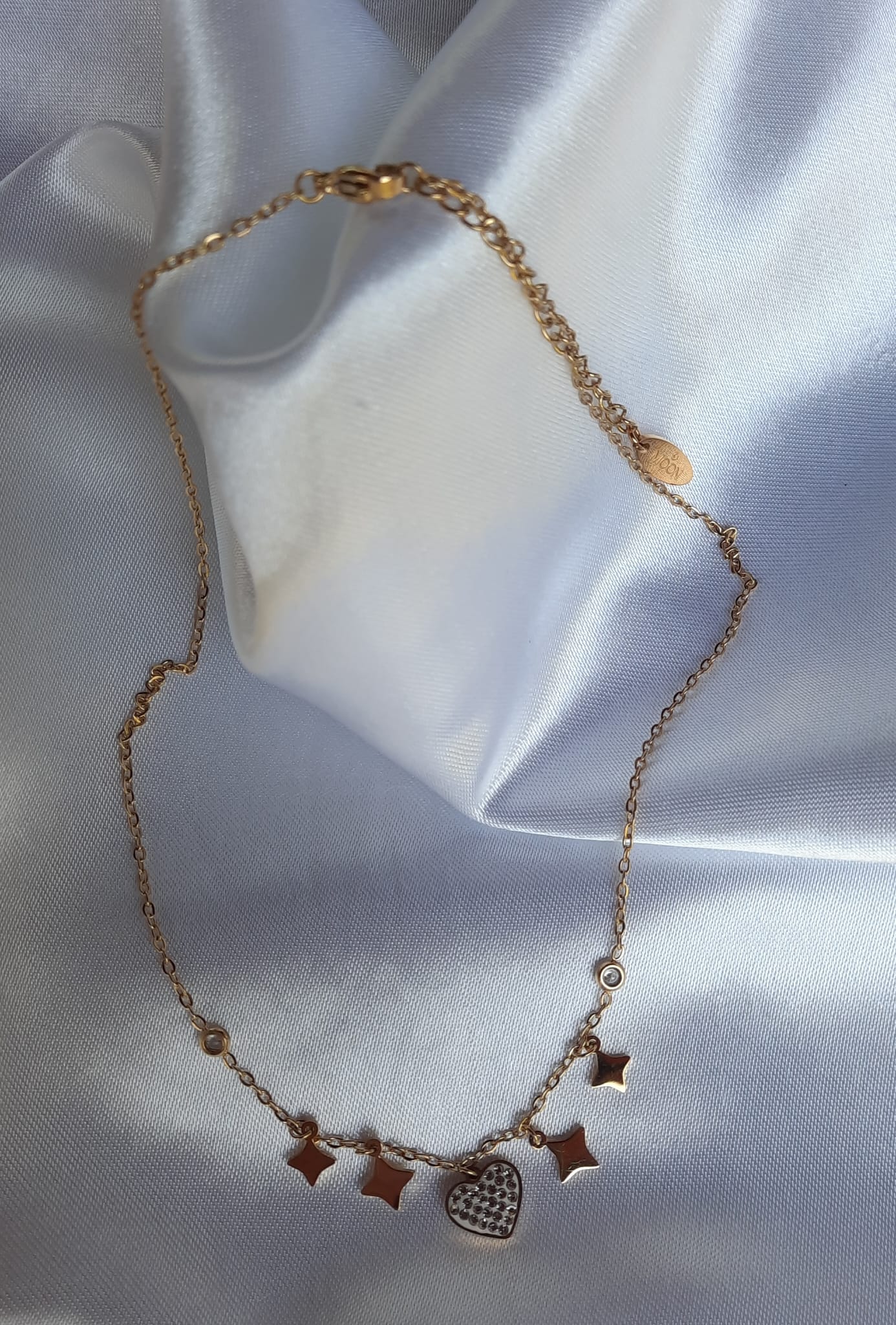 Korte ketting met hart en sterren