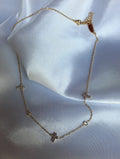 Minimalistische ketting met kruisjes