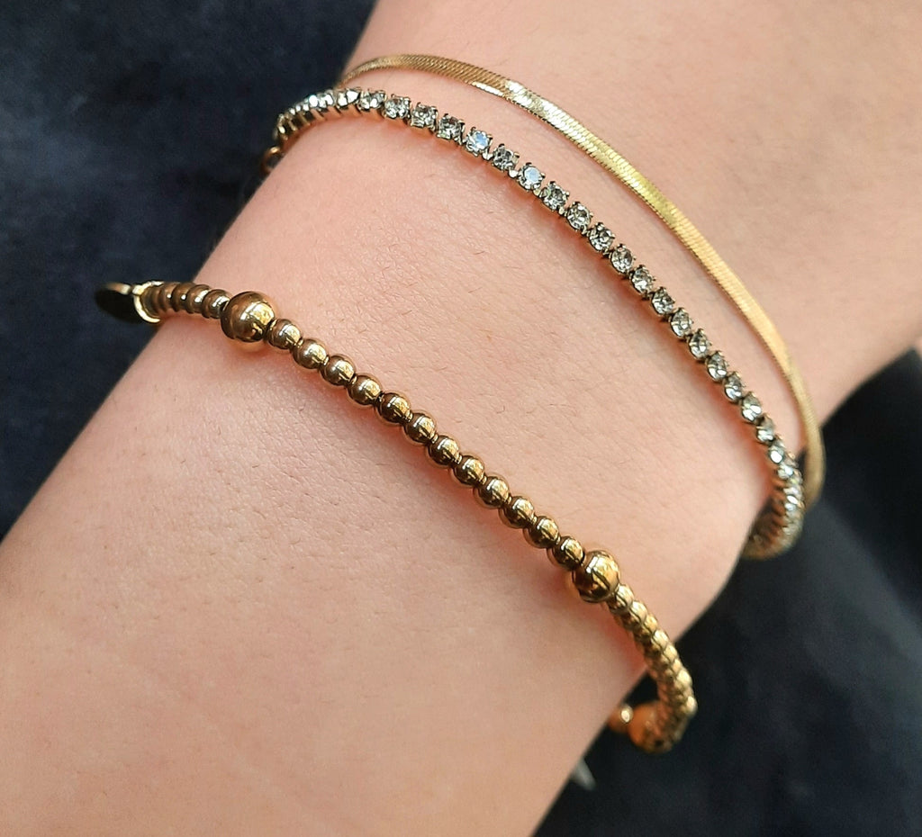 Stretch armband gouden kralen
