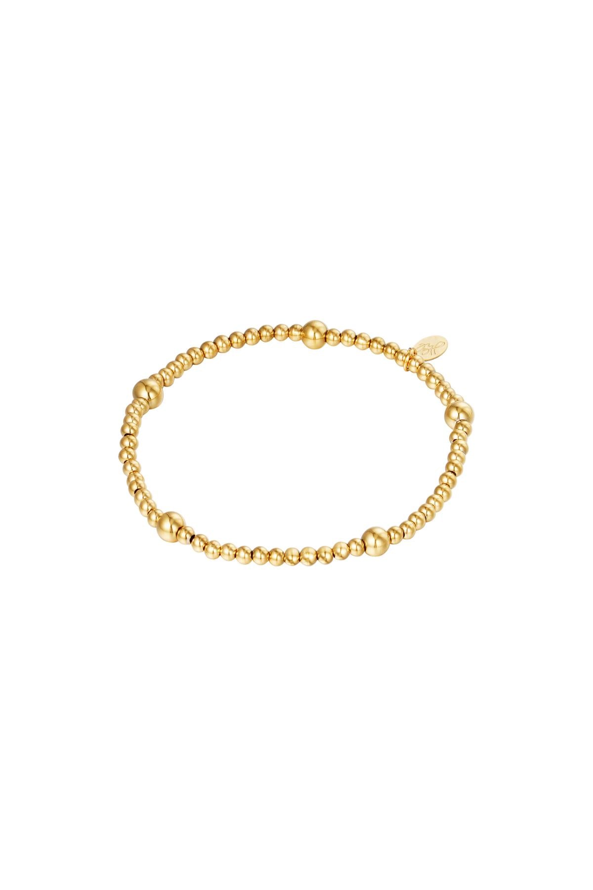 Stretch armband gouden kralen